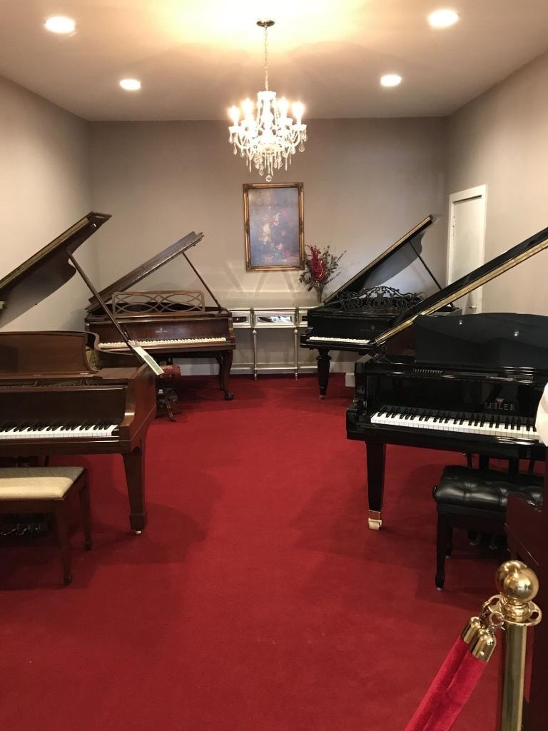 Peabody's Piano Co. showroom — elegant piano room
